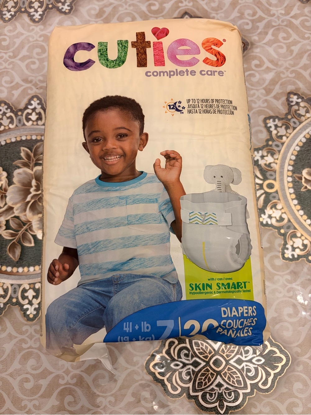 Complete Care Size 7 Diapers - Neutral Cream Packaging